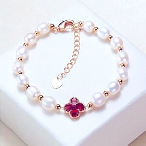 Elegant Pearl & Gold Bracelet with Red Clover Charm